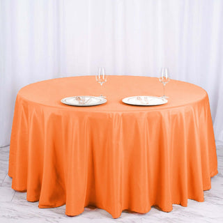 Add Elegance to Your Events with the 120" Orange Seamless Polyester Round Tablecloth Add Elegance to Your Events with the 120" Orange Seamless Polyester Round Tablecloth