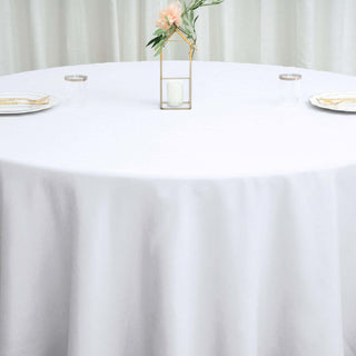 Create Timeless Elegance with the 120" White Seamless Polyester Round Tablecloth Create Timeless Elegance with the 120" White Seamless Polyester Round Tablecloth