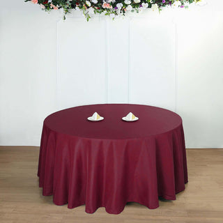 Add Elegance to Your Events with the Burgundy Seamless Polyester Round Tablecloth Add Elegance to Your Events with the Burgundy Seamless Polyester Round Tablecloth