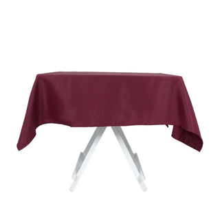 Experience Elegance and Versatility with the Burgundy Premium Polyester Square Tablecloth Experience Elegance and Versatility with the Burgundy Premium Polyester Square Tablecloth