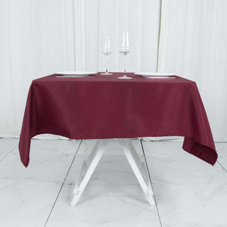 Elevate Your Event Decor with the Burgundy Premium Polyester Square Tablecloth Elevate Your Event Decor with the Burgundy Premium Polyester Square Tablecloth