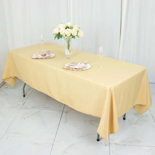 Easy Elegance with the Champagne Premium Polyester Rectangular Tablecloth Easy Elegance with the Champagne Premium Polyester Rectangular Tablecloth
