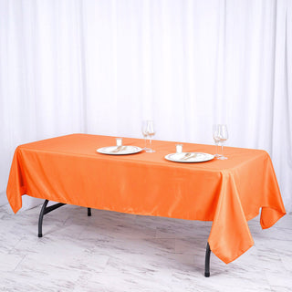 Add Elegance and Durability to Your Event with the Orange Seamless Polyester Rectangular Tablecloth