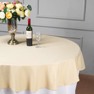 Enhance Your Décor with the Beige 70" Round Seamless Polyester Linen Tablecloth