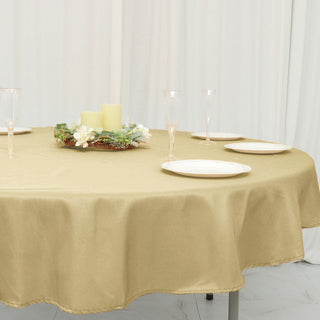 Enhance Your Dining Experience with the 70" Round Champagne Seamless Polyester Linen Tablecloth