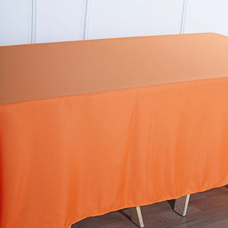 Create a Festive Atmosphere with the 90"x132" Orange Seamless Polyester Rectangular Tablecloth Create a Festive Atmosphere with the 90"x132" Orange Seamless Polyester Rectangular Tablecloth