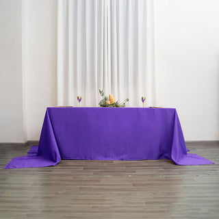 Add Elegance to Your Event with the 90"x156" Purple Seamless Polyester Rectangular Tablecloth