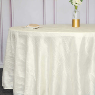 Unleash the Beauty of Your Tables with the Ivory Seamless Accordion Crinkle Taffeta Round Tablecloth Unleash the Beauty of Your Tables with the Ivory Seamless Accordion Crinkle Taffeta Round Tablecloth