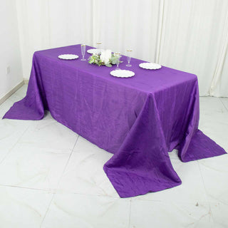 Create a Regal Atmosphere with the 90"x132" Purple Accordion Crinkle Taffeta Seamless Rectangular Tablecloth