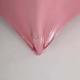 Close-up of a pink satin fabric corner detail.