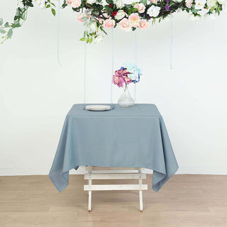 Create a Stunning Event Setting with the Dusty Blue Square Polyester Table Overlay Create a Stunning Event Setting with the Dusty Blue Square Polyester Table Overlay