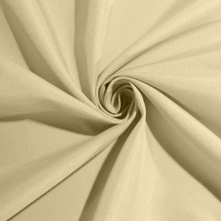 Beige fabric swirl texture close-up for design and sewing projects.