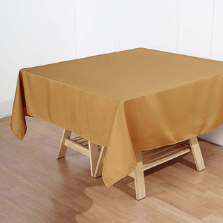 Enhance Your Event with the 70"x70" Gold Square Polyester Tablecloth Enhance Your Event with the 70"x70" Gold Square Polyester Tablecloth