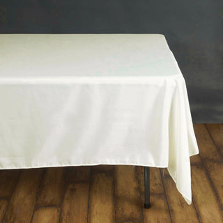 Create Memorable Moments with the Ivory Square Seamless Polyester Tablecloth