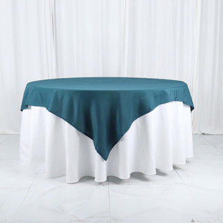 Elevate Your Event Decor with the Peacock Teal 70x70 Table Overlay Elevate Your Event Decor with the Peacock Teal 70x70 Table Overlay