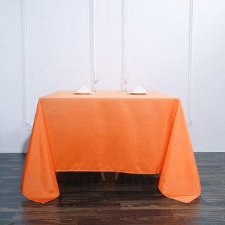 Brighten Up Your Event with the 90x90 Orange Seamless Square Polyester Tablecloth