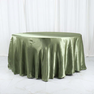 Round olive green tablecloth with elegant draping