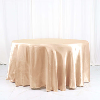Elevate Your Event with the 120" Nude Seamless Satin Round Tablecloth Elevate Your Event with the 120" Nude Seamless Satin Round Tablecloth