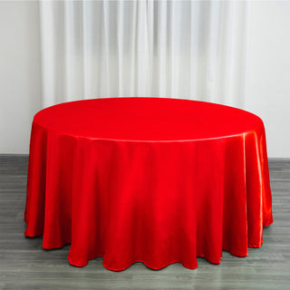 Add Elegance to Your Event with the 120" Red Seamless Satin Round Tablecloth