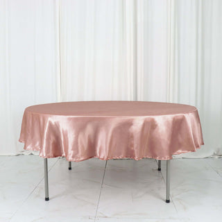 Dusty Rose Décor: Elevate Your Event with the 90" Dusty Rose Satin Round Tablecloth Dusty Rose Décor: Elevate Your Event with the 90" Dusty Rose Satin Round Tablecloth
