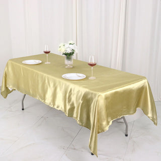Create a Luxurious Setting with the 60"x102" Champagne Seamless Smooth Satin Rectangular Tablecloth