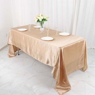 Unleash the Beauty of Nude Satin with our Event Decor Tablecloth Unleash the Beauty of Nude Satin with our Event Decor Tablecloth