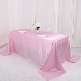Create a Memorable Event with the Pink Satin Seamless Rectangular Tablecloth