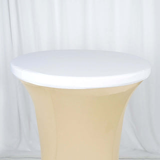 White round table cover on a beige fitted table