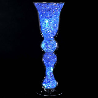 Blue illuminated decorative vase with a unique shape and crystal-like design.