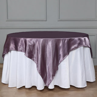 Enhance Your Event Decor with the 72"x72" Violet Amethyst Seamless Satin Square Tablecloth Overlay