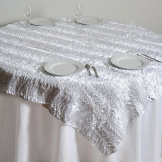 Elevate Your Event with a White Crushed Satin 3D Wavy Square Table Overlay