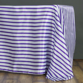 Create a Striking Tablescape with the White/Purple Seamless Stripe Satin Rectangle Tablecloth