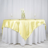 72 Inch x 72 Inch | Yellow Seamless Satin Square Tablecloth Overlay | TableclothsFactory