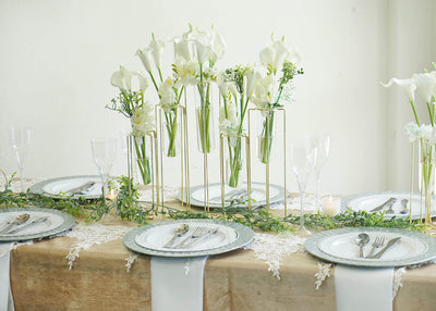 Scandinavian-style summer table setting with white flowers