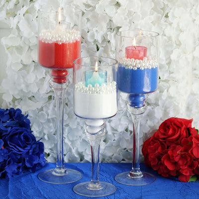 Three patriotic candle centerpieces with flowers and pearls