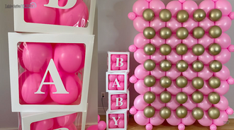 Baby shower display box and balloon wall decor setup