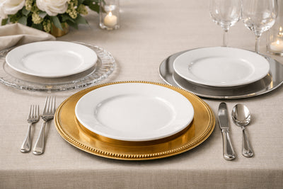 Example of charger plates used in a formal table setting with layered dinnerware