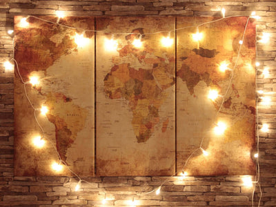 World map wall art with string lights