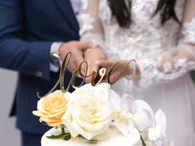 Wedding cake with floral topper