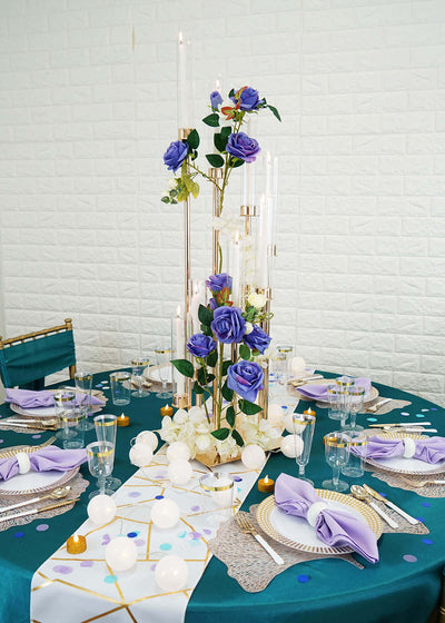 Teal and lavender tablescape with floral centerpiece