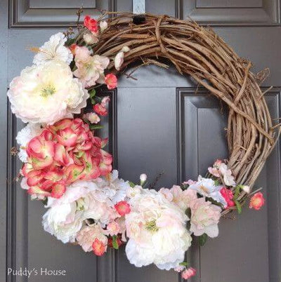 Floral wreath on a dark front door