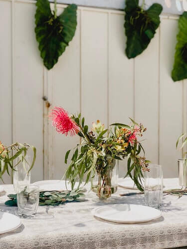 Lace table setting with floral centerpiece