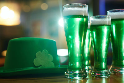 Green drinks and a shamrock hat