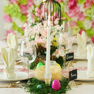 Easter tablescape with floral centerpiece and candles
