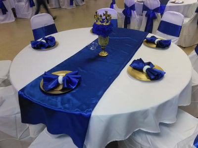 Round table with blue and white linens
