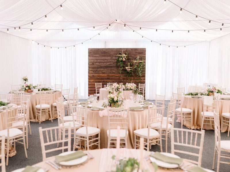 Boho rustic wedding backdrop with round mirror and florals