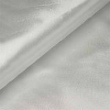 Silky white fabric draped elegantly, showcasing a smooth texture.