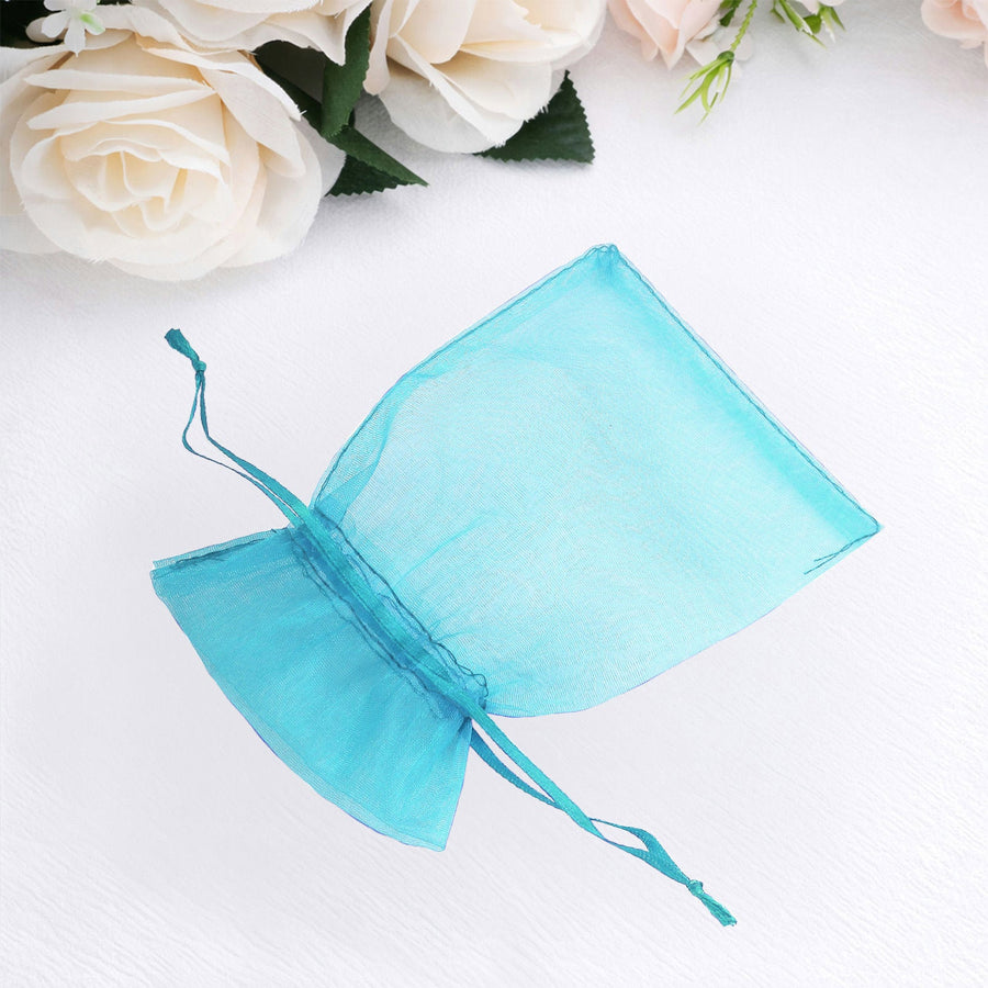 Turquoise organza gift bag with drawstring closure