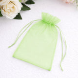 Green organza gift bag with drawstring closure