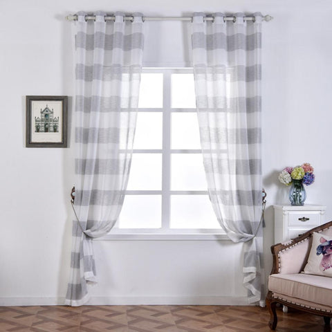 Gray plaid sheer curtains framing a window